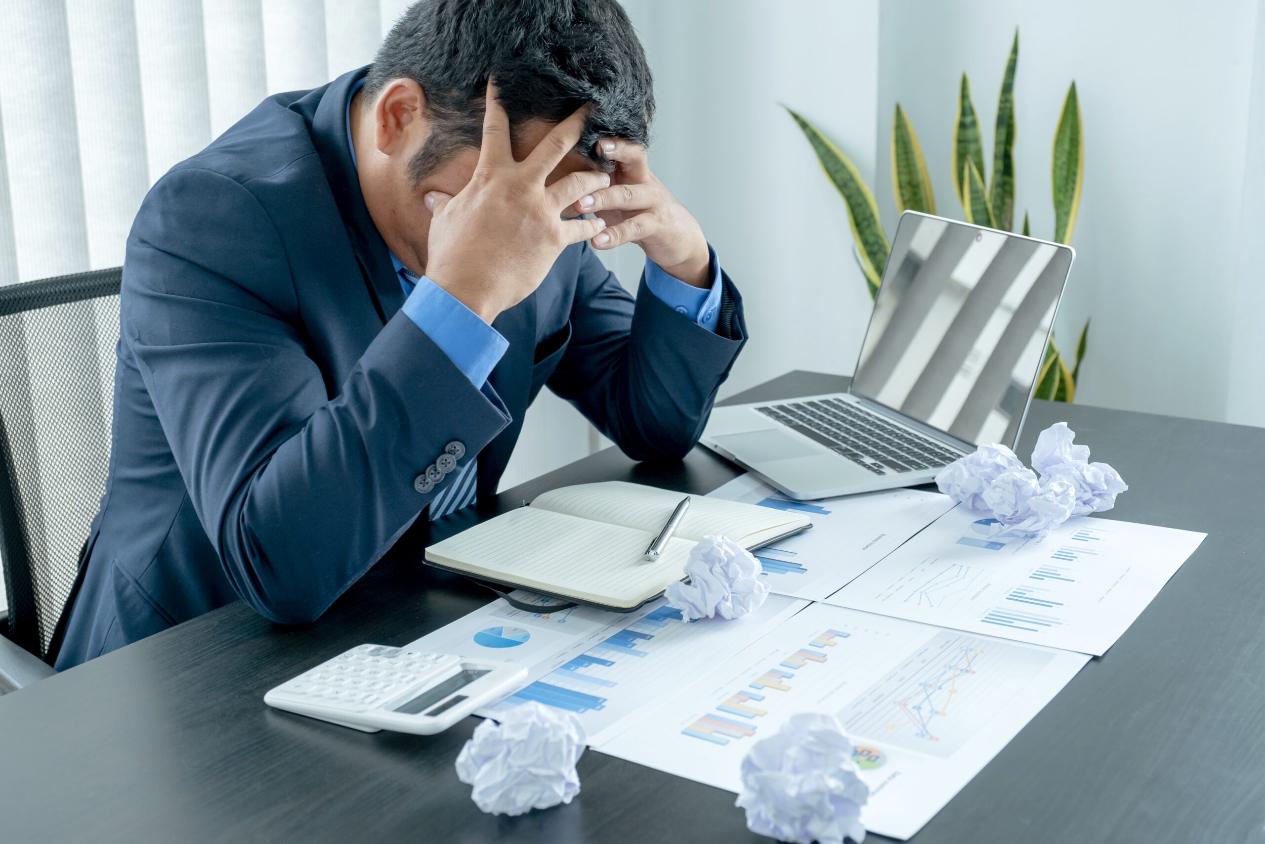 Businessman acted with tired stress anxiety from the frustrated